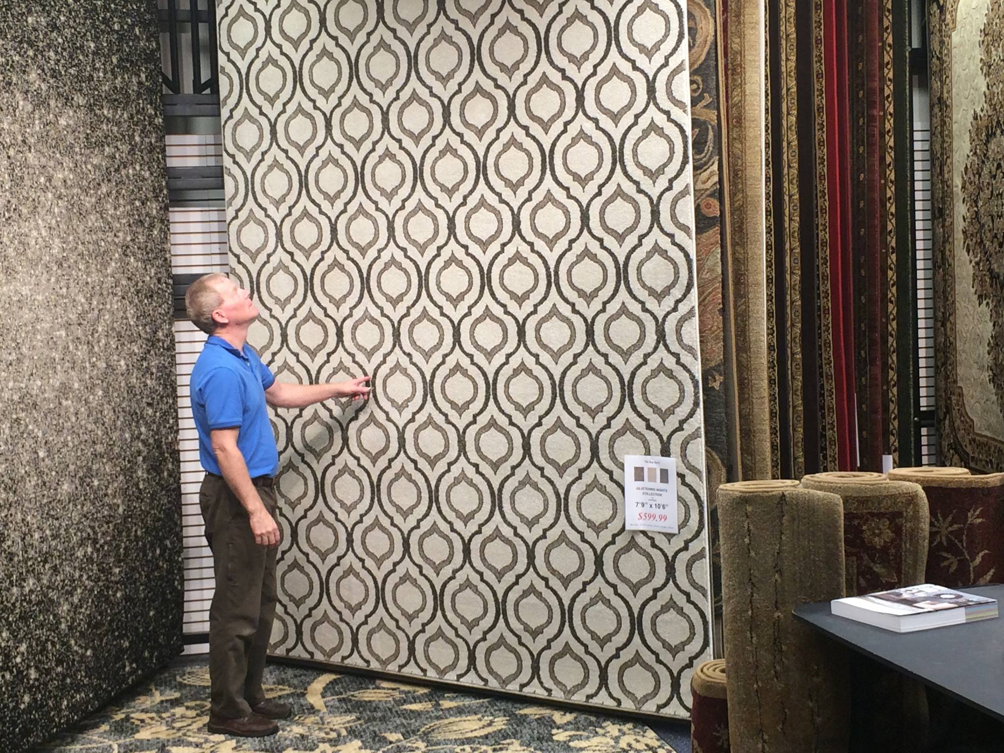 At The Rug Rack shop, viewing display of Muted Color Area rugs - Springfield, IL