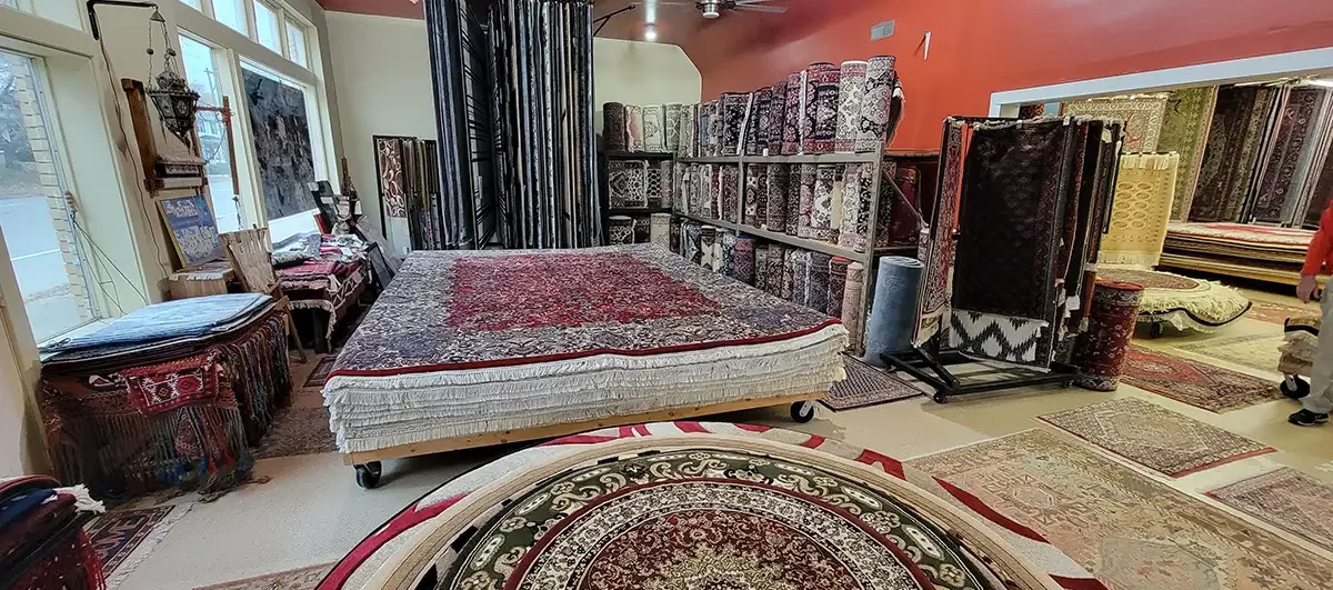 Rug Rack & Murphy Rug Cleaners - Variety of carpets/ Persian carpets and rugs on display in shop - Springfield, IL